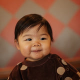 Oversized one suit - chocolate polka dot