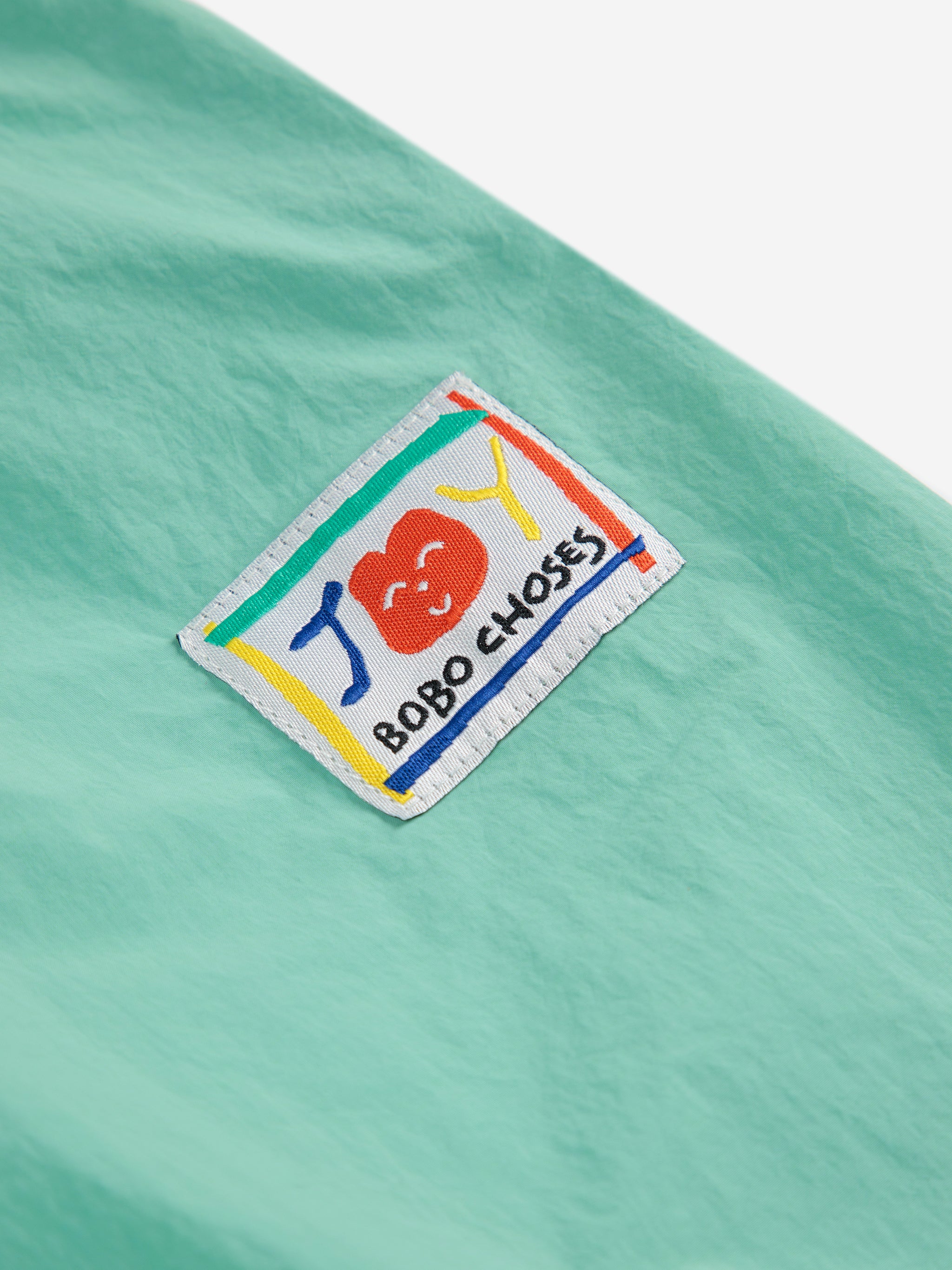 BOBO CHOSES / Smiling color block tracksuit pants